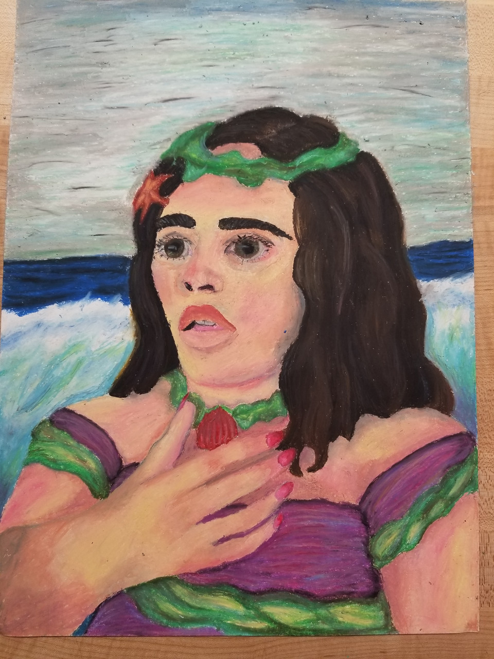 An oil pastel drawing of a person with a green and red necklace and a purple top. There are water waves behind.