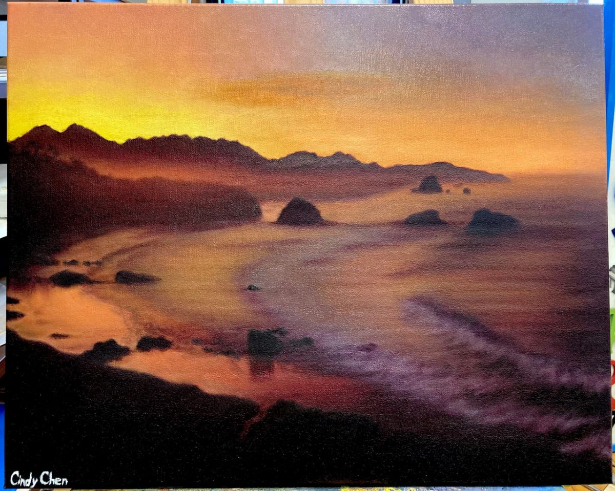 A painting of a sunset along the beach.