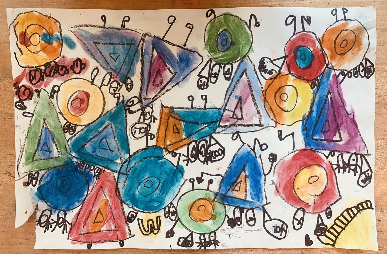 Small pieces of water color painting are turned into many colorful characters on the page.