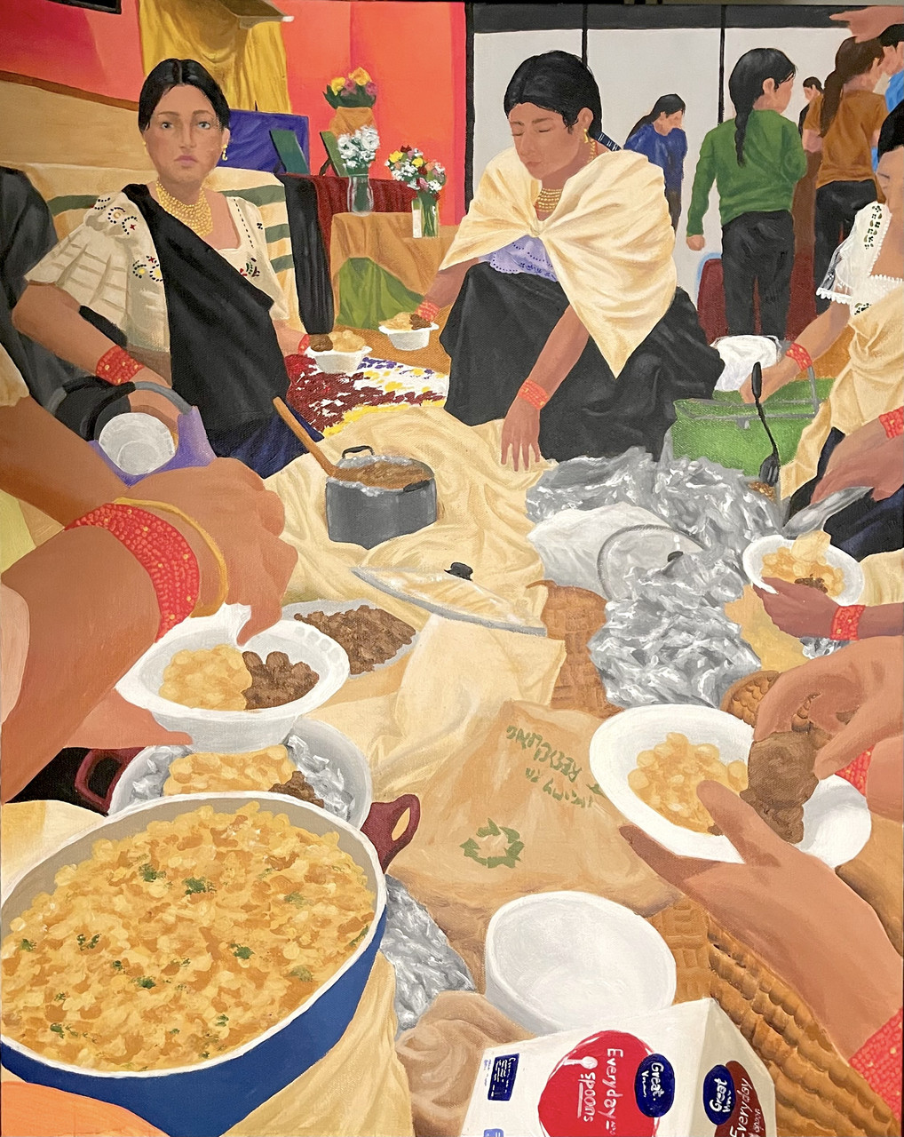 A table filled with food and a family surrounding it.
