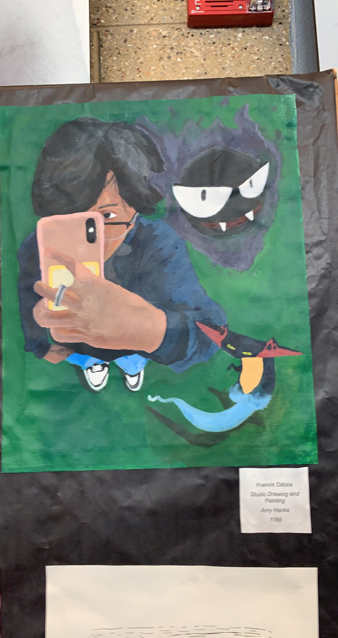 A selfie image with a spooky character appearing over the person's right shoulder.