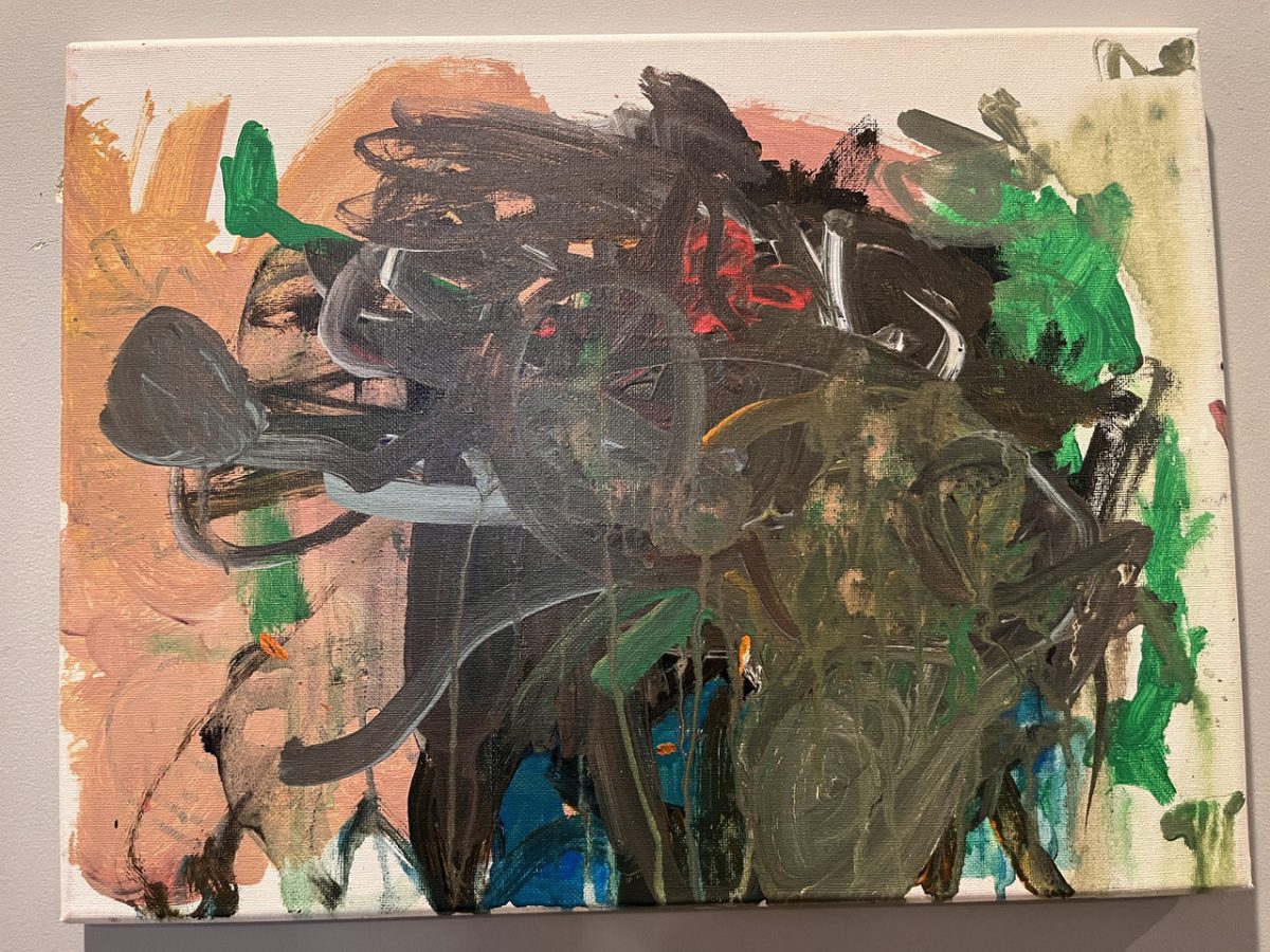 Canvas is covered in paint. Abstract with colors peach, brown, blue, and green.