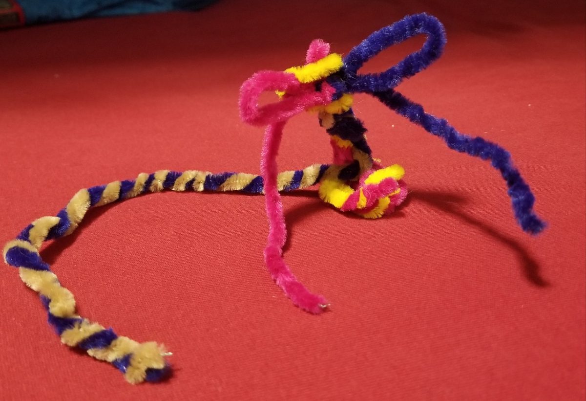 Pipe cleaners twisted together to make a 3D sculpture.