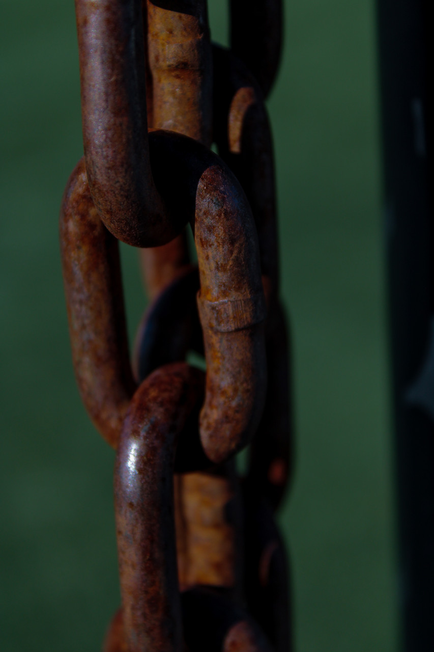 photograph closely cropped of rusty chains