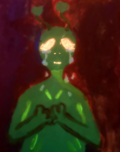 Image of a crying, green alien with yellow glowing eyes, a red background.