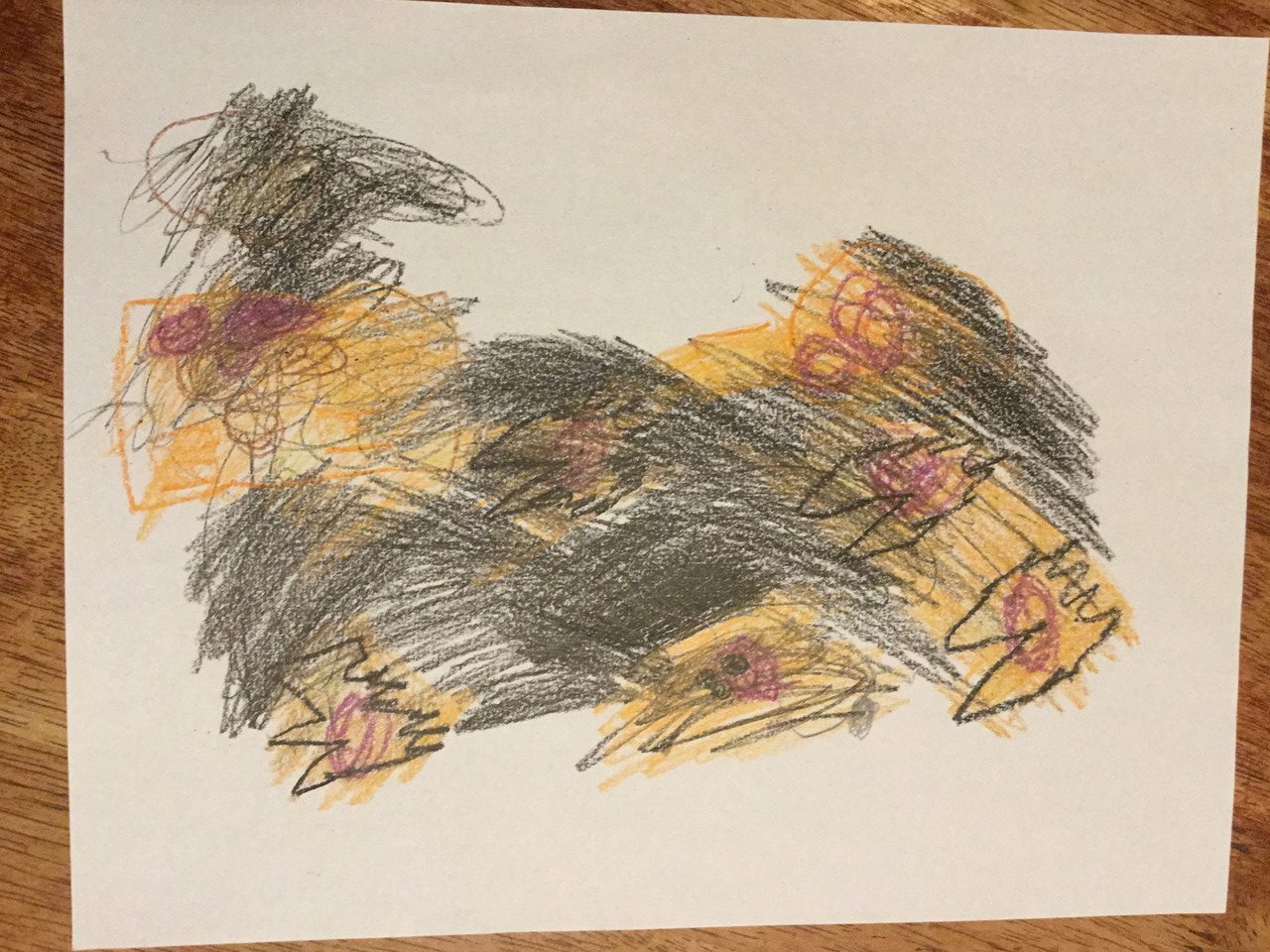 Crayon and pencil abstraction of browns and black, expressive and fast moving lines.