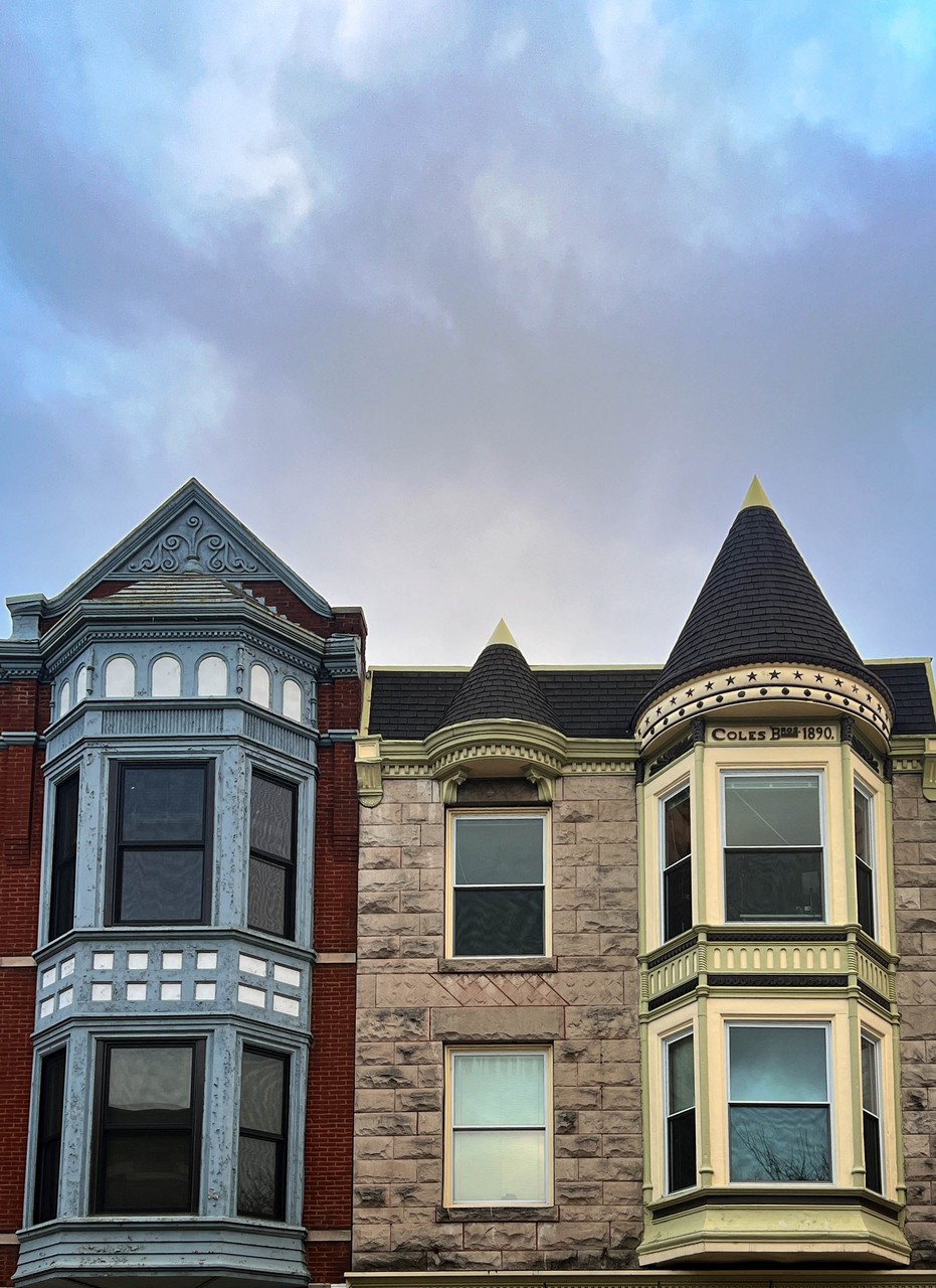 3 buildings with blue sky