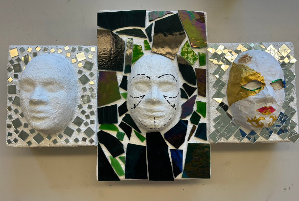 White masks with mosaic mirror