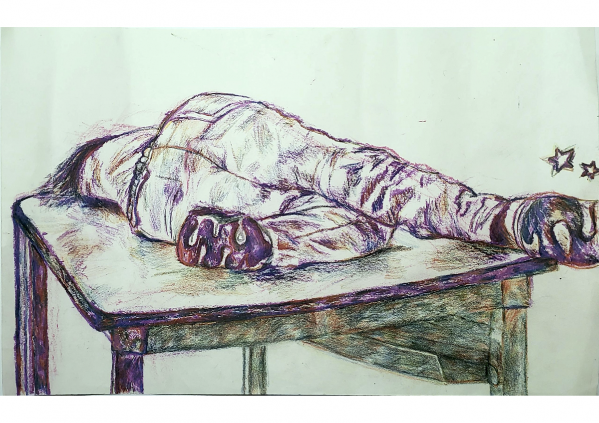 Person laying on a desk