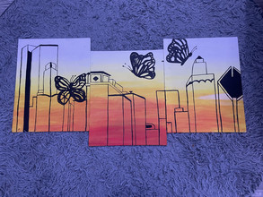 Tryptic sunset, outline of cityscape, and butterflies.