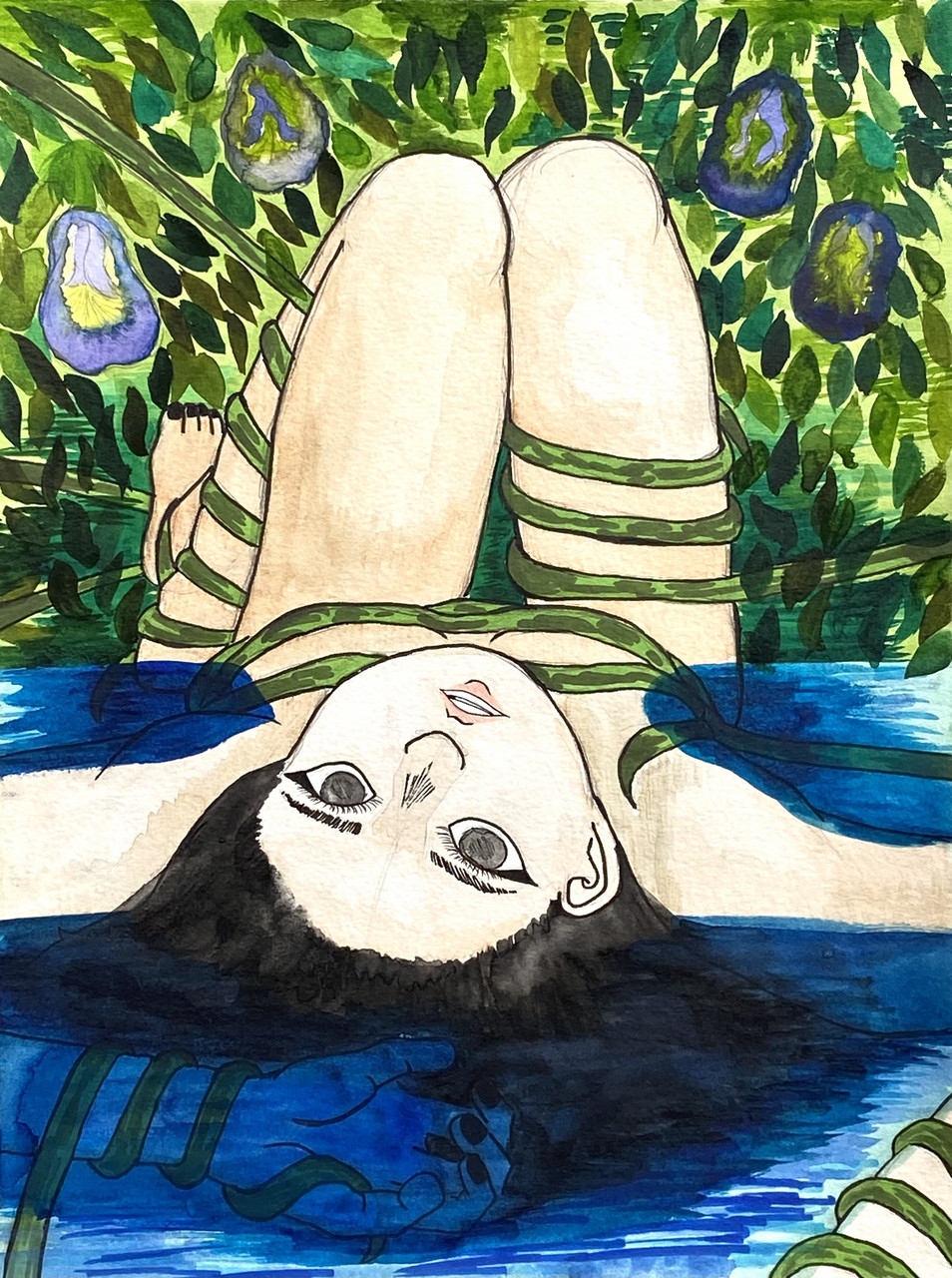 Woman laying in a body of water wrapped in vines
