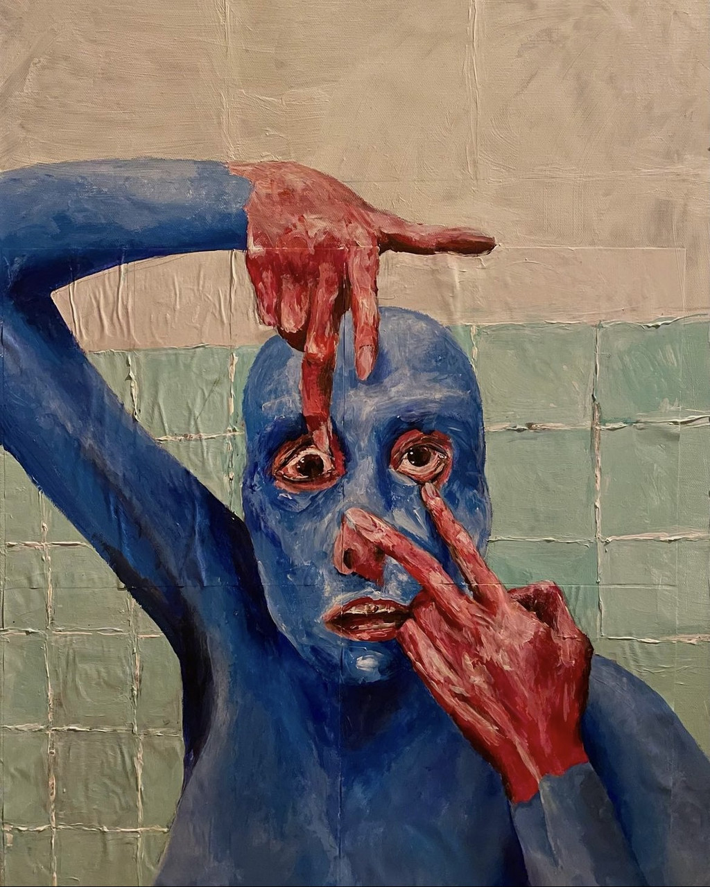 Blue masked with hands opening up the eyes.