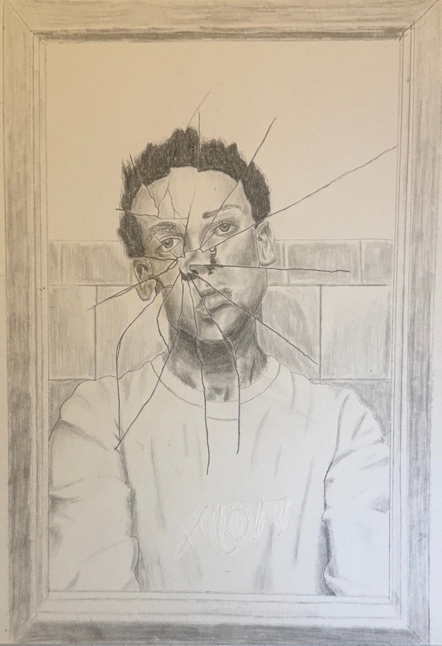 A person looking into a broken mirror