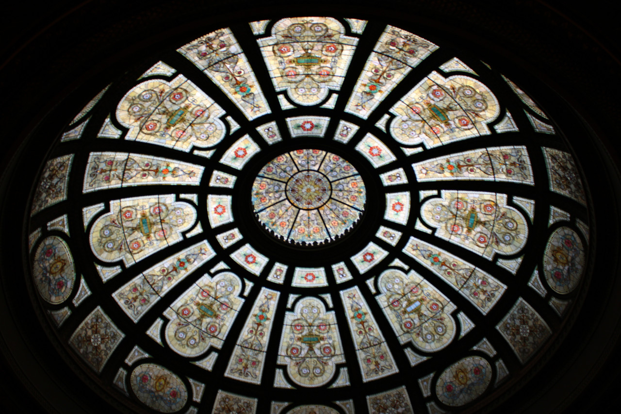 A photograph of an ornate Tiffany dome from below