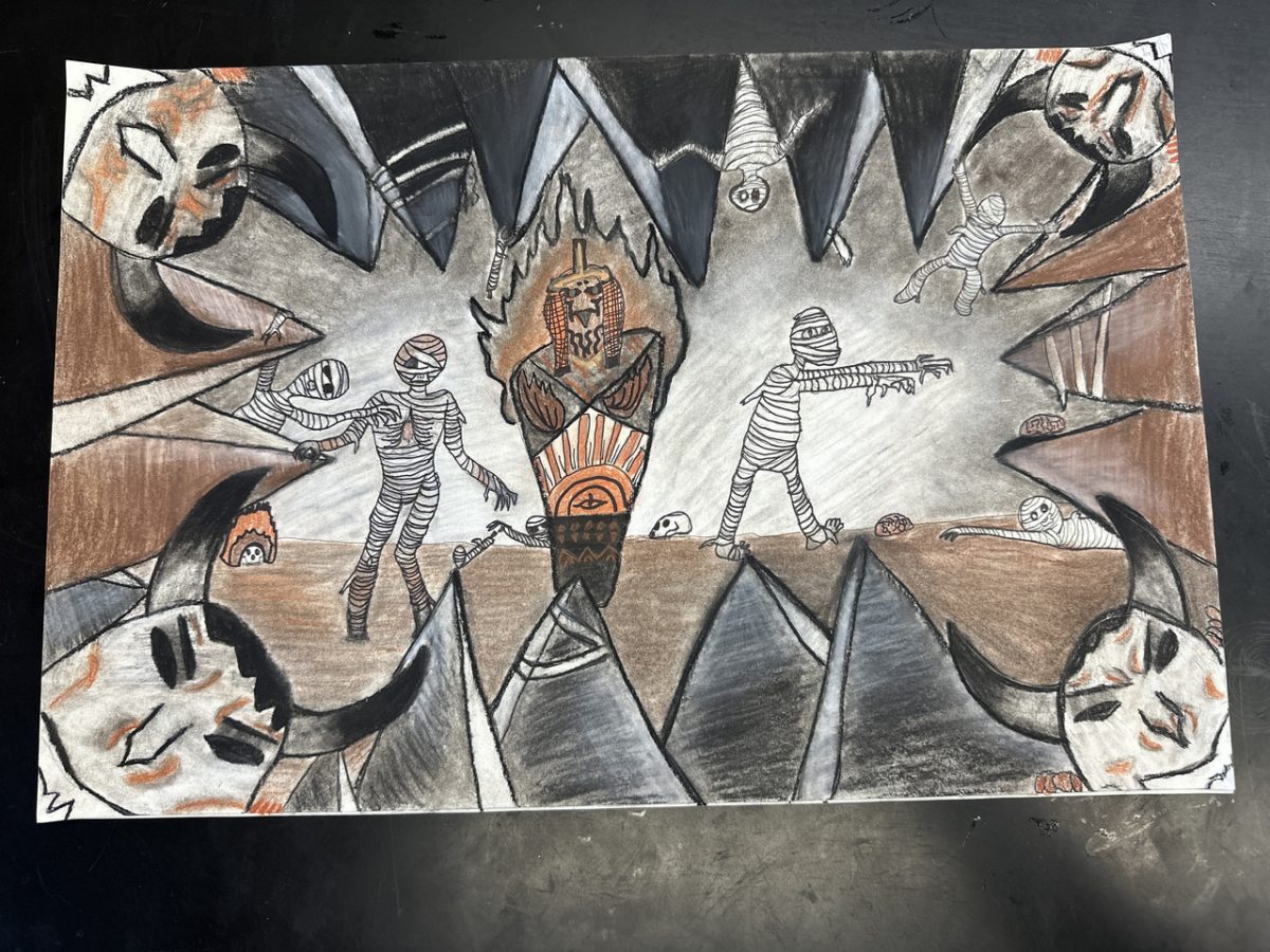 Horned masks at the four corners of the page with black spikes coming up from the sides. A tomb in the middle with mummies crawling on the side