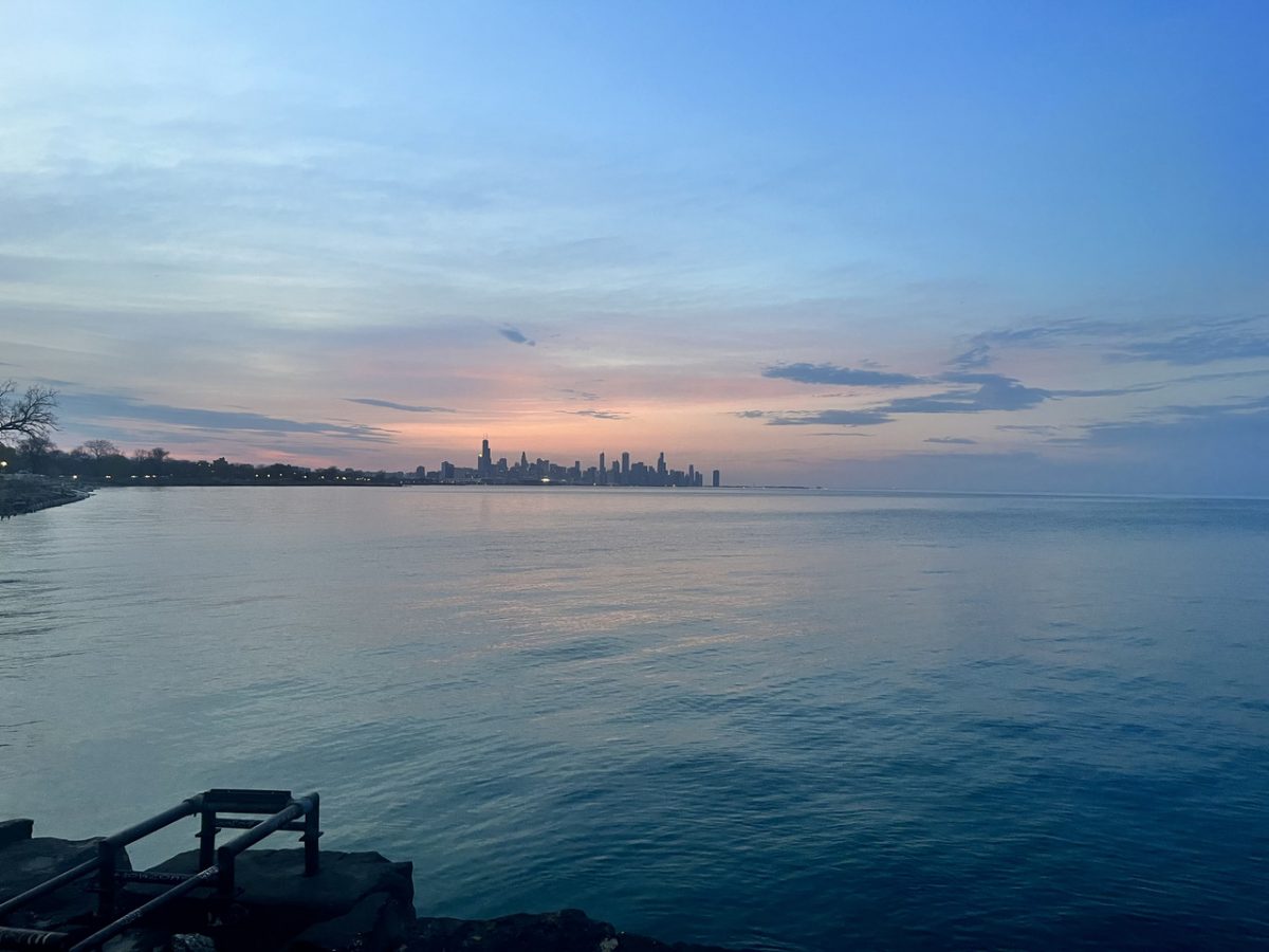 Pink and blue sunset on the lake from downtown Chicago