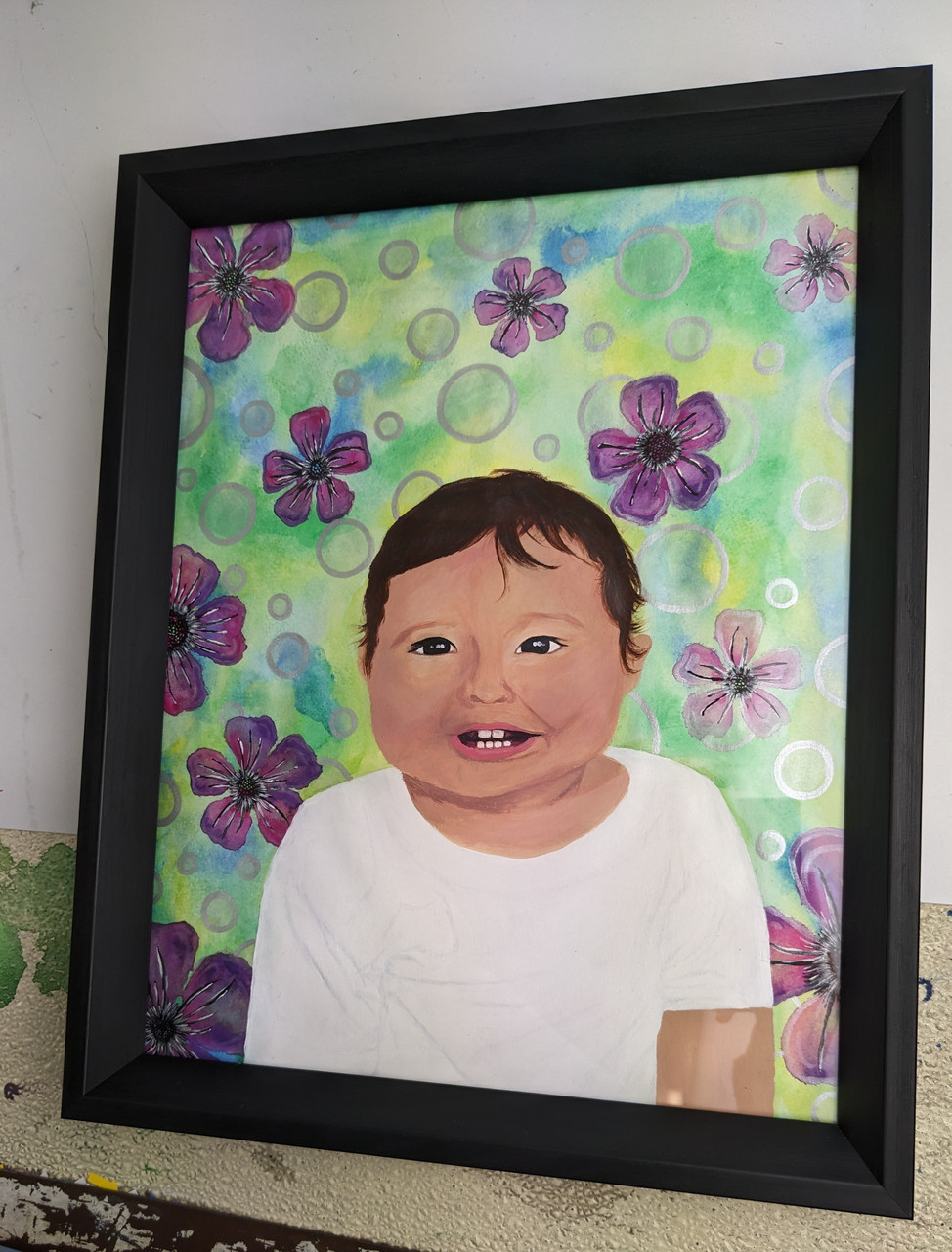 painting baby flowers smiling
