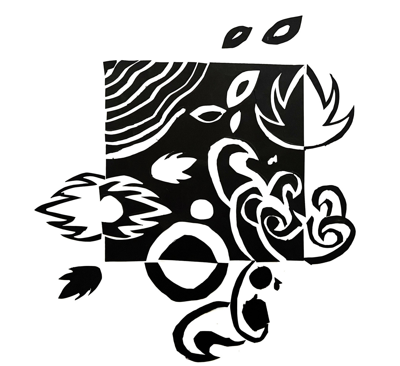 Detailed black paper cut outs layered over white paper.