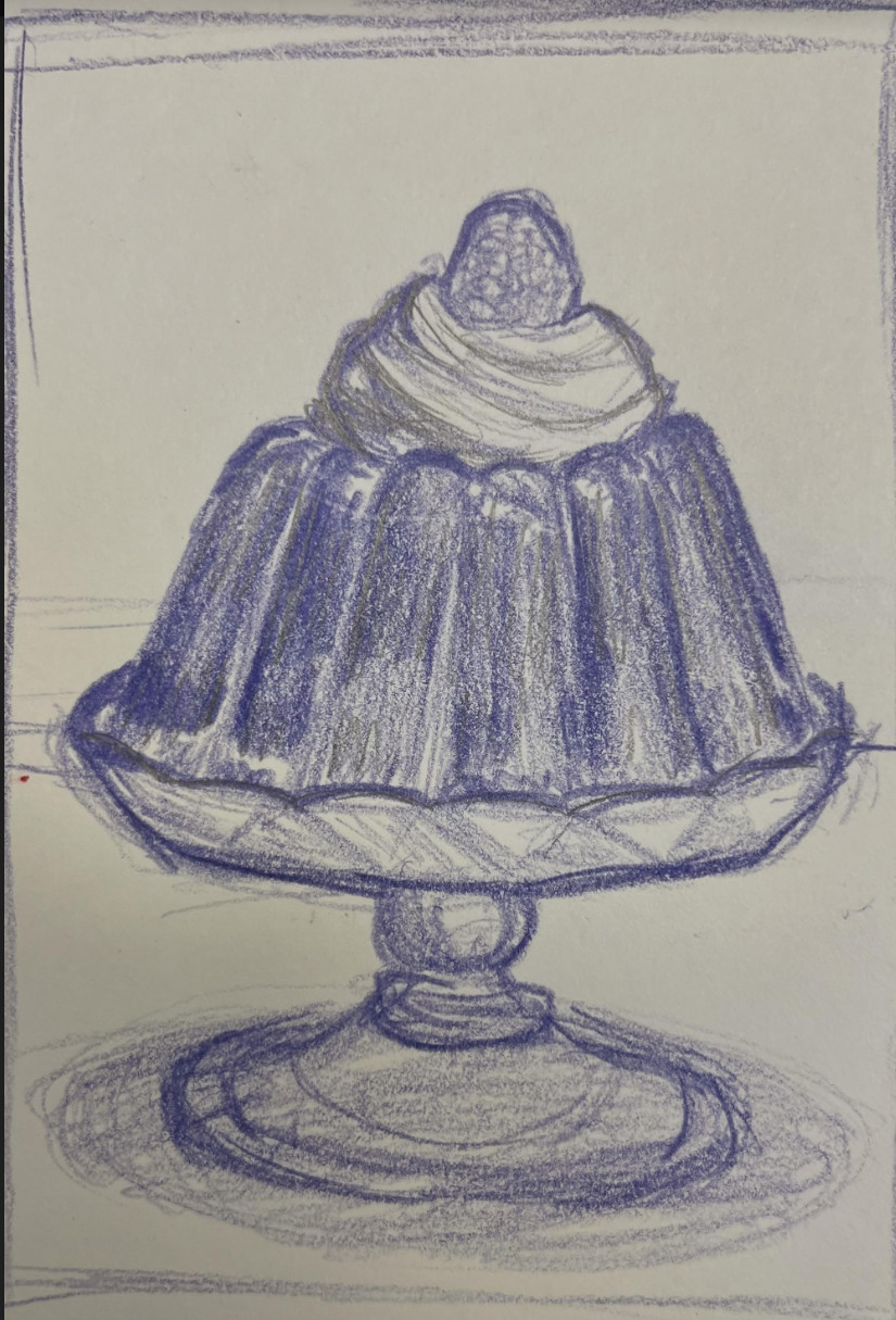 Jello with whipped cream served on a dish with a cherry on top