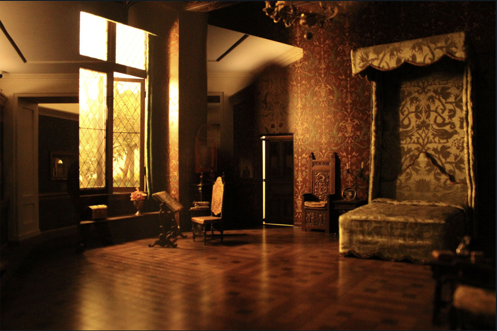 Luxury room with large window, sunlit.