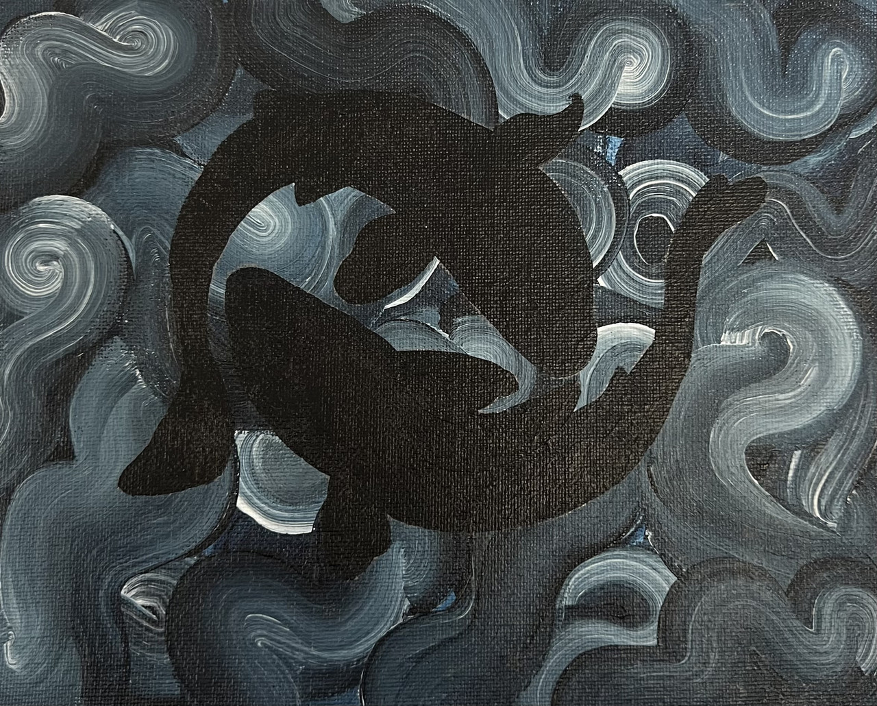 Two silhouettes of koi fish swim around each other resembling a yin and yang symbol. The background is a swirling black and white pattern