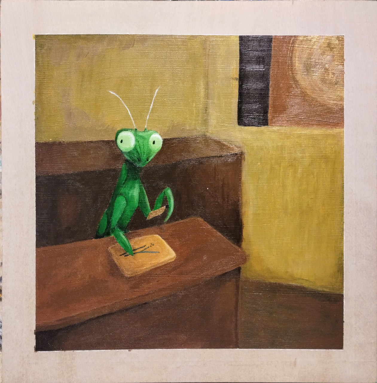 Green praying classroom sits at wood desk. Surrounded by wood furniture and yellow wallks