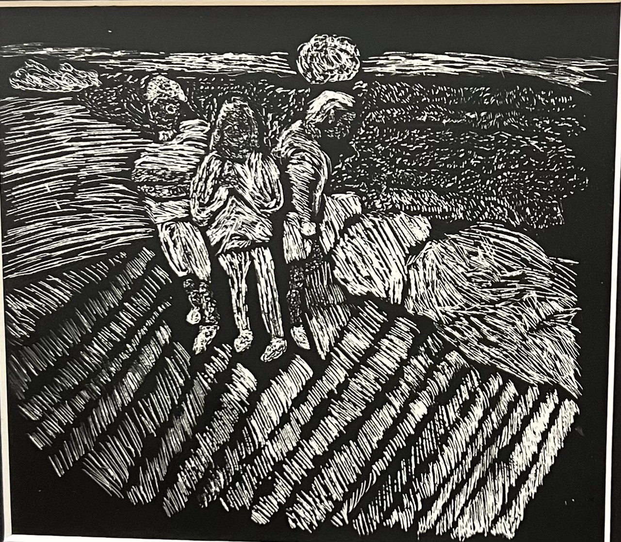 The artist's friends from school are huddled around the ledge of Montrose Beach