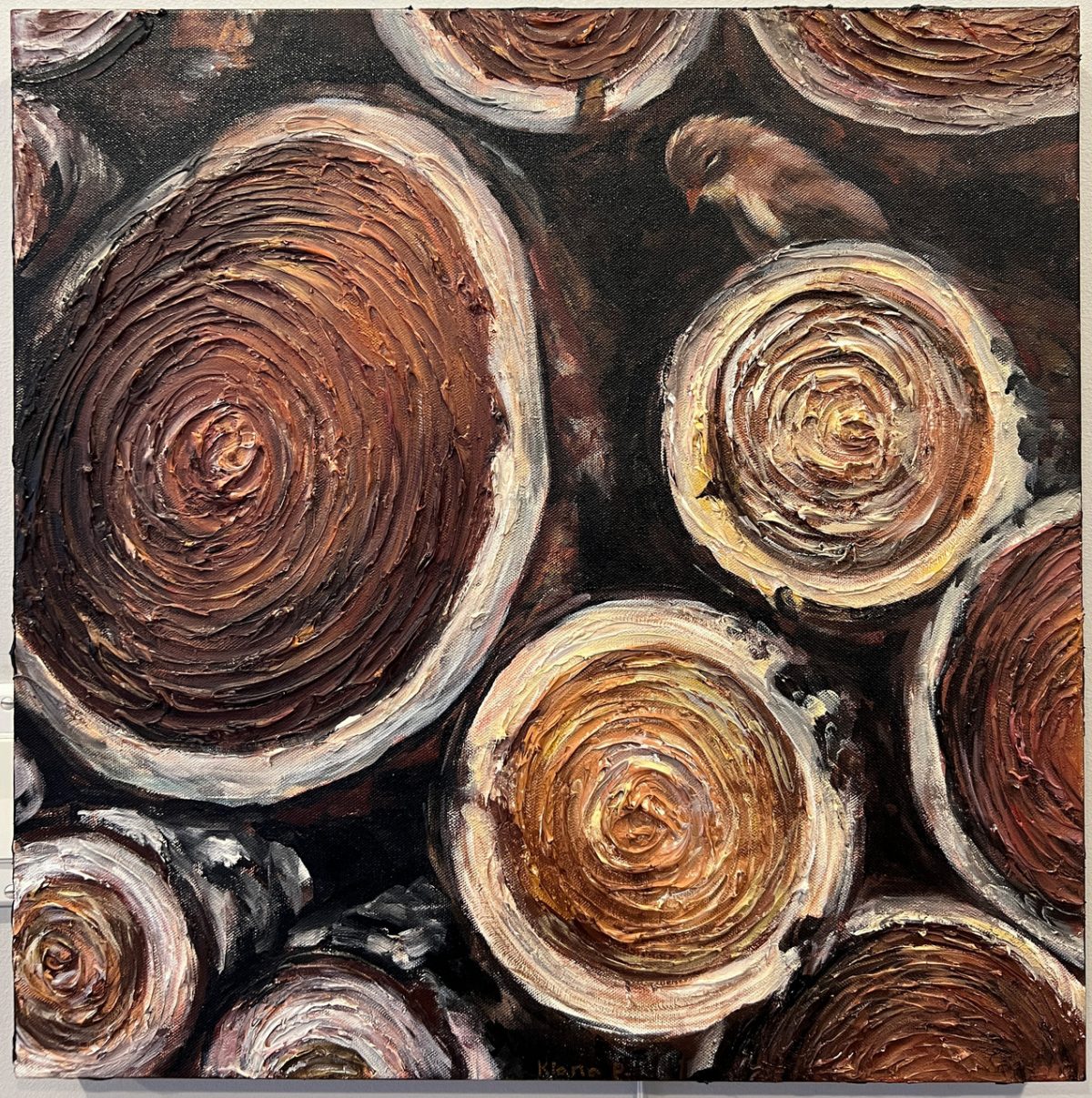 Painting of many logs stacked on top of each other, their rings clear. A sparrow looks down from atop one of the logs at the others.