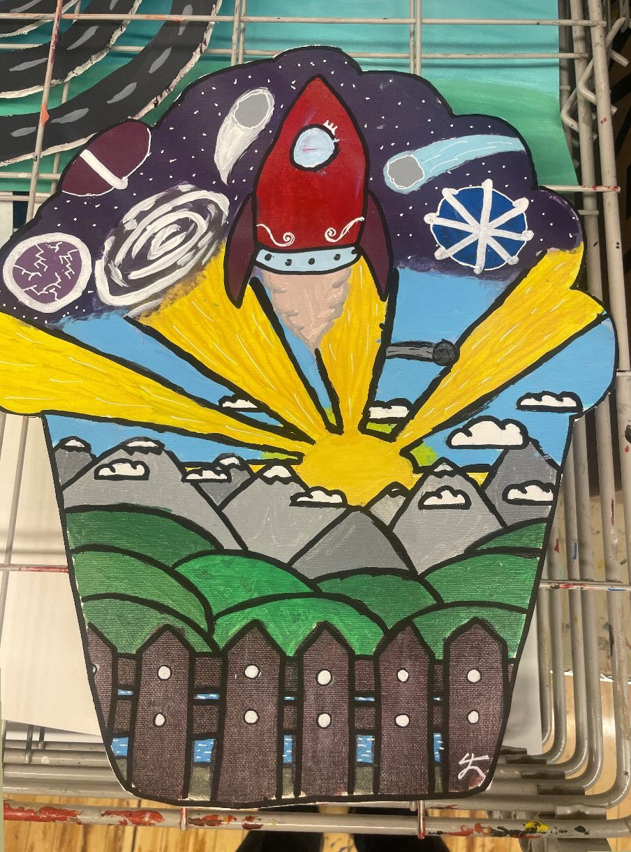 Hills and mountains with a radiant sun in the middle. At the top is a rocket ship with planets surrounding it.