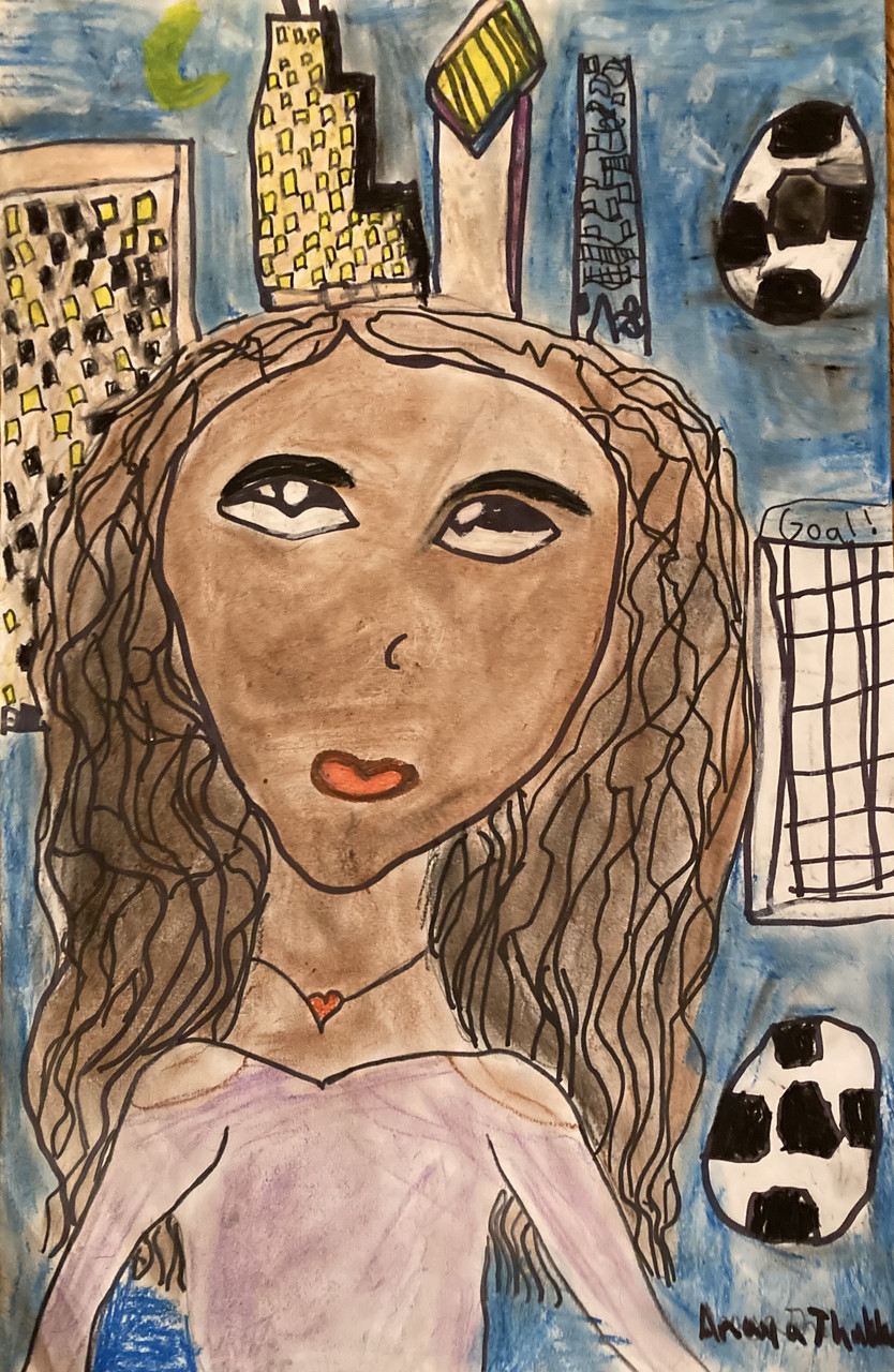 Girl with curly hair and soccer balls
