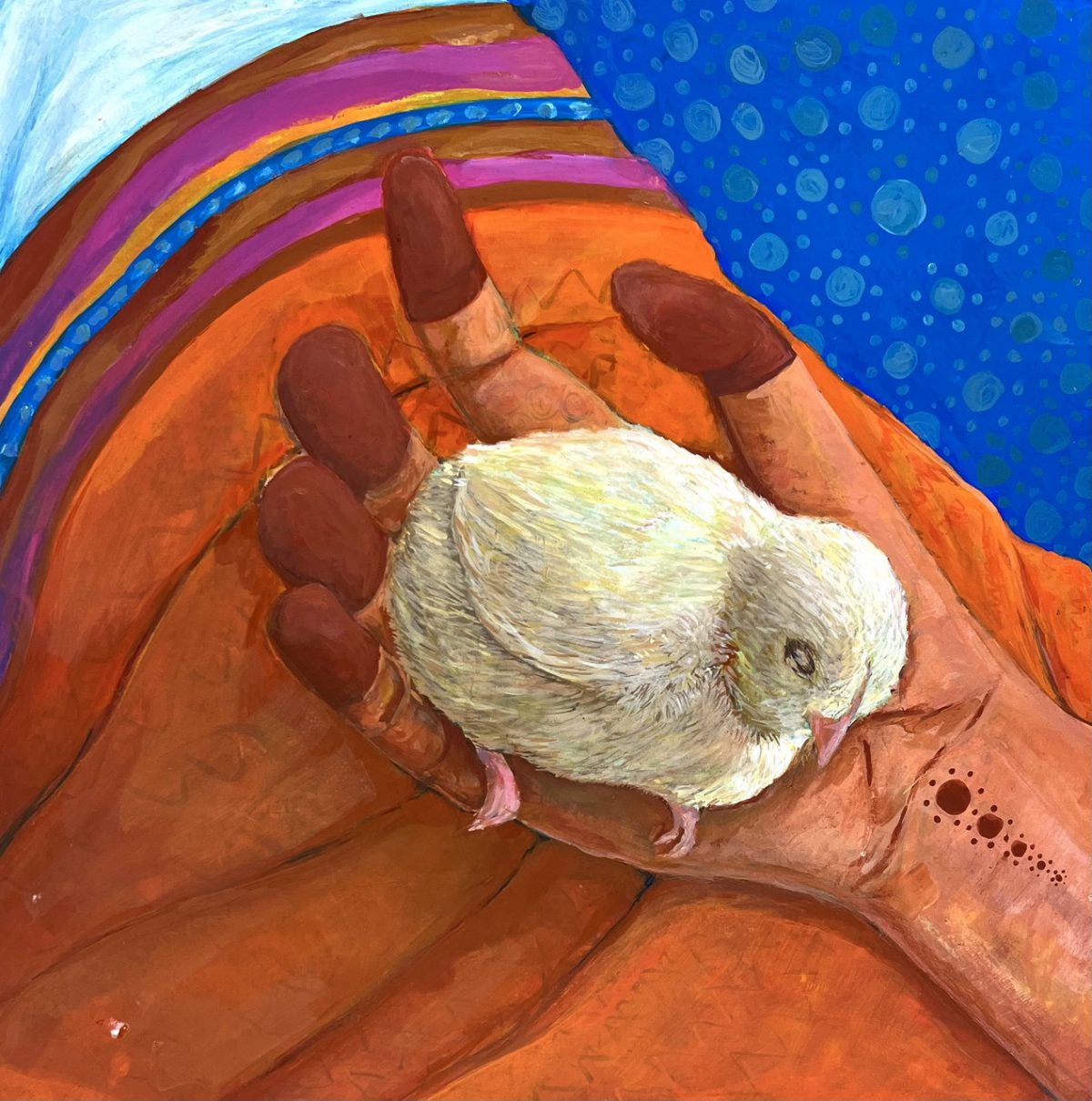 Multi-colored painting of small chick in hand of tan skinned person in lap showing orange clothing with pink and orange stripe adorning bottom. Background is blue patterned.