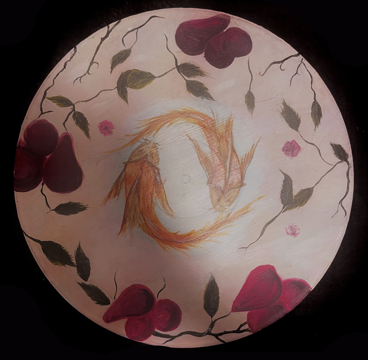 Vinyl record painted pink with flowers and koi fish